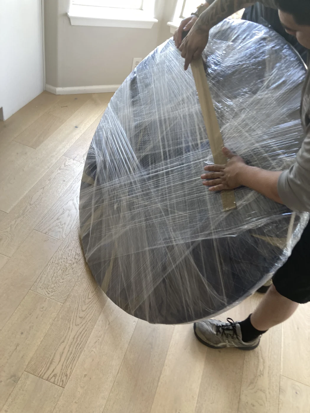 Table wrapping in progress during a residential move