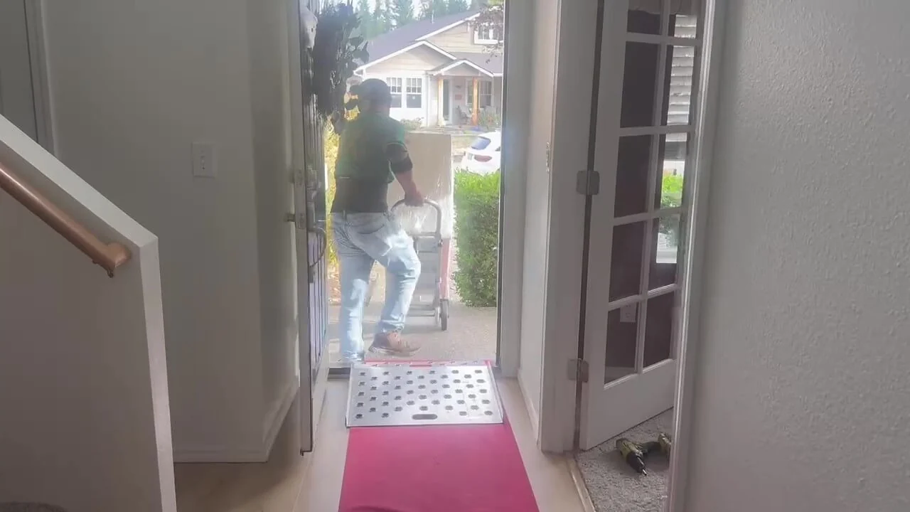 Arrival and doorway carry during a residential move